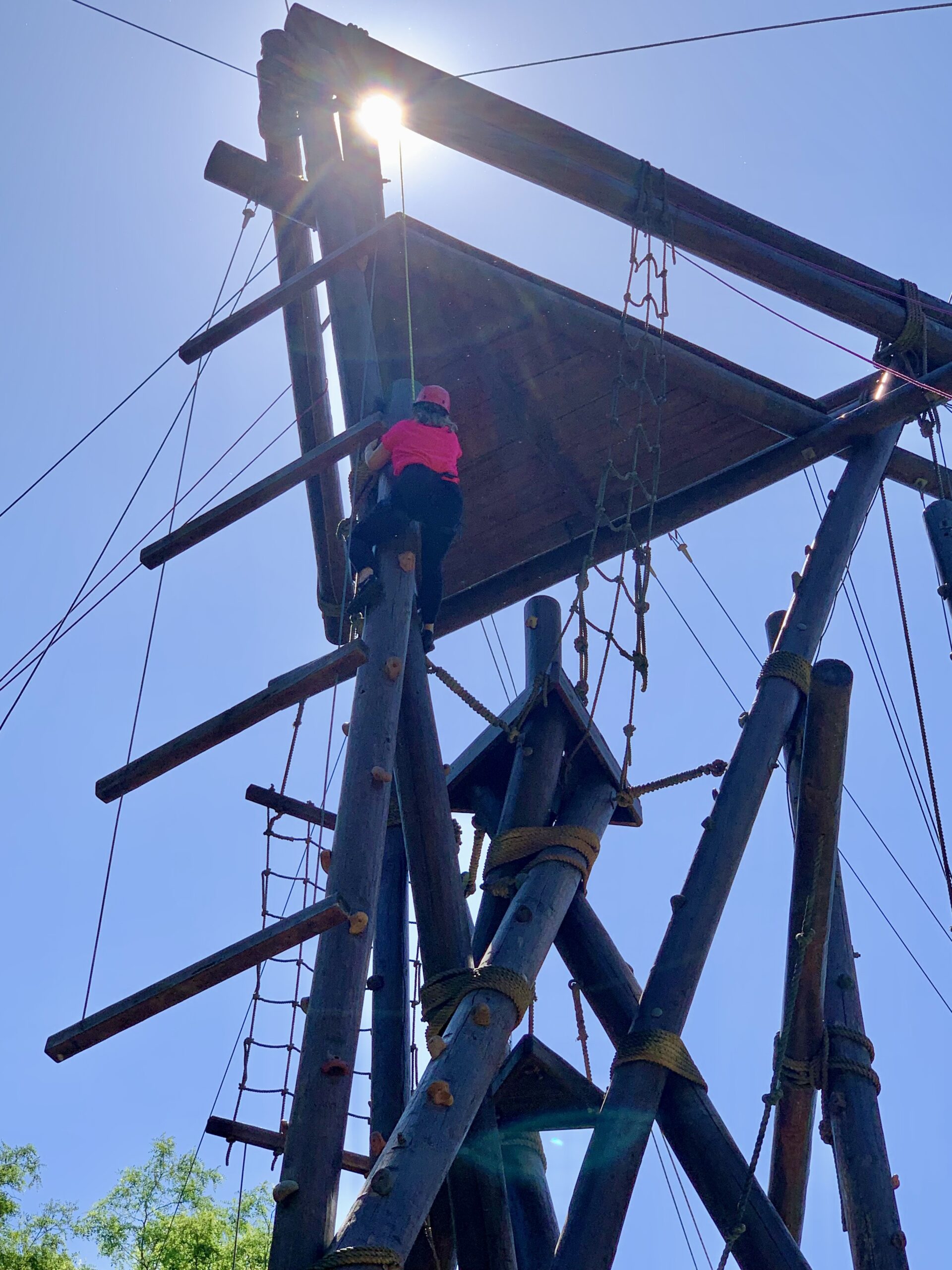 Robin Wood Sailer climbing a ropes course in New Jersey.